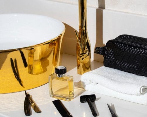 high-angle-male-self-care-setting-still-life (1) Golden Elegance